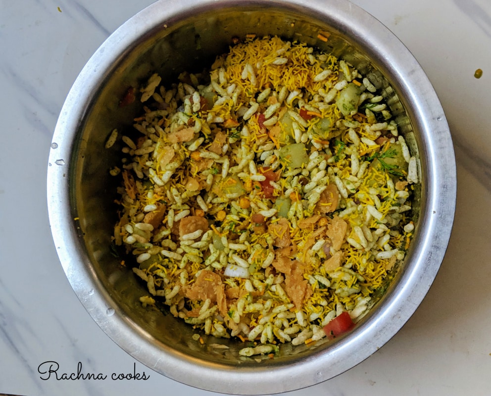 Mixed bhel puri in a steel container