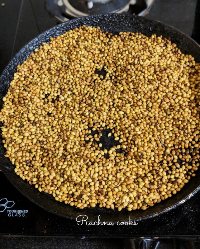 Toasted coriander seeds in a skillet