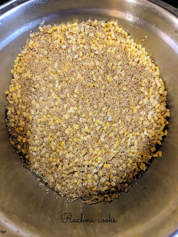 Foxtail millets and yellow lentils that have been washed and drained in a bowl 