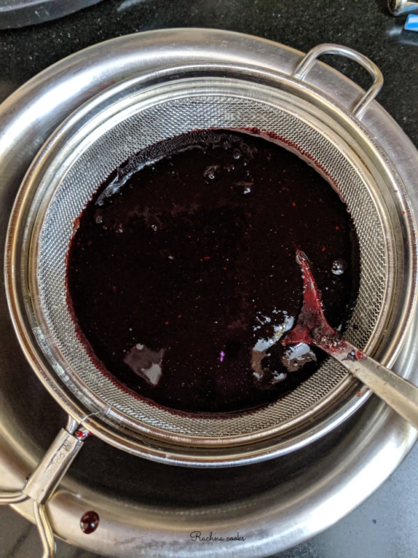 kokum concentrate being strained