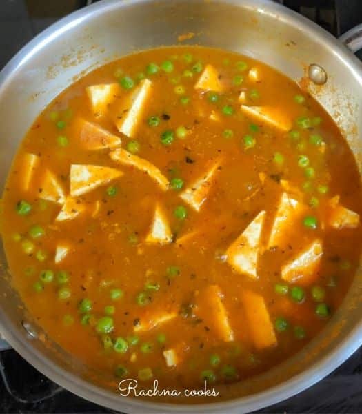 Matar paneer curry done in a steel wok